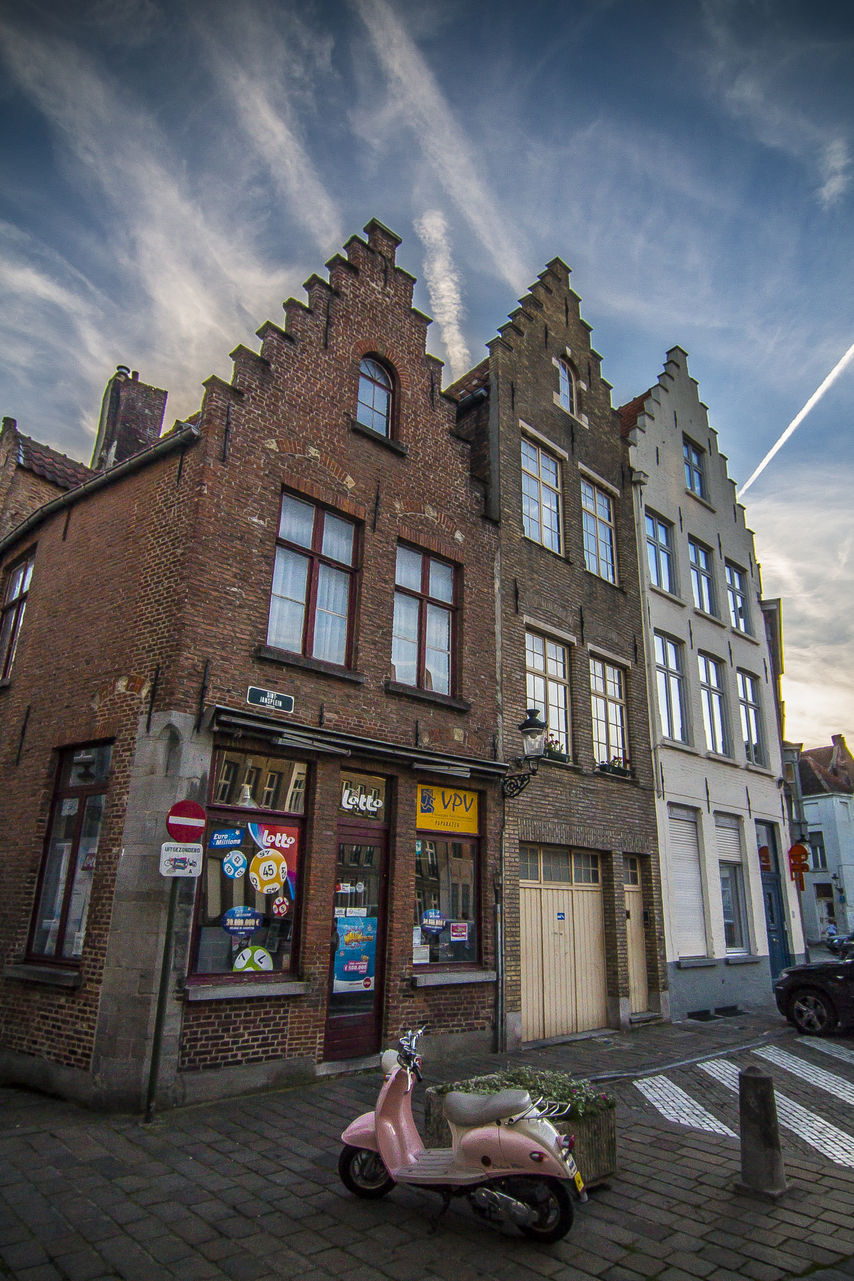 Belgian streets: Pink Vespa on Brugge's streets